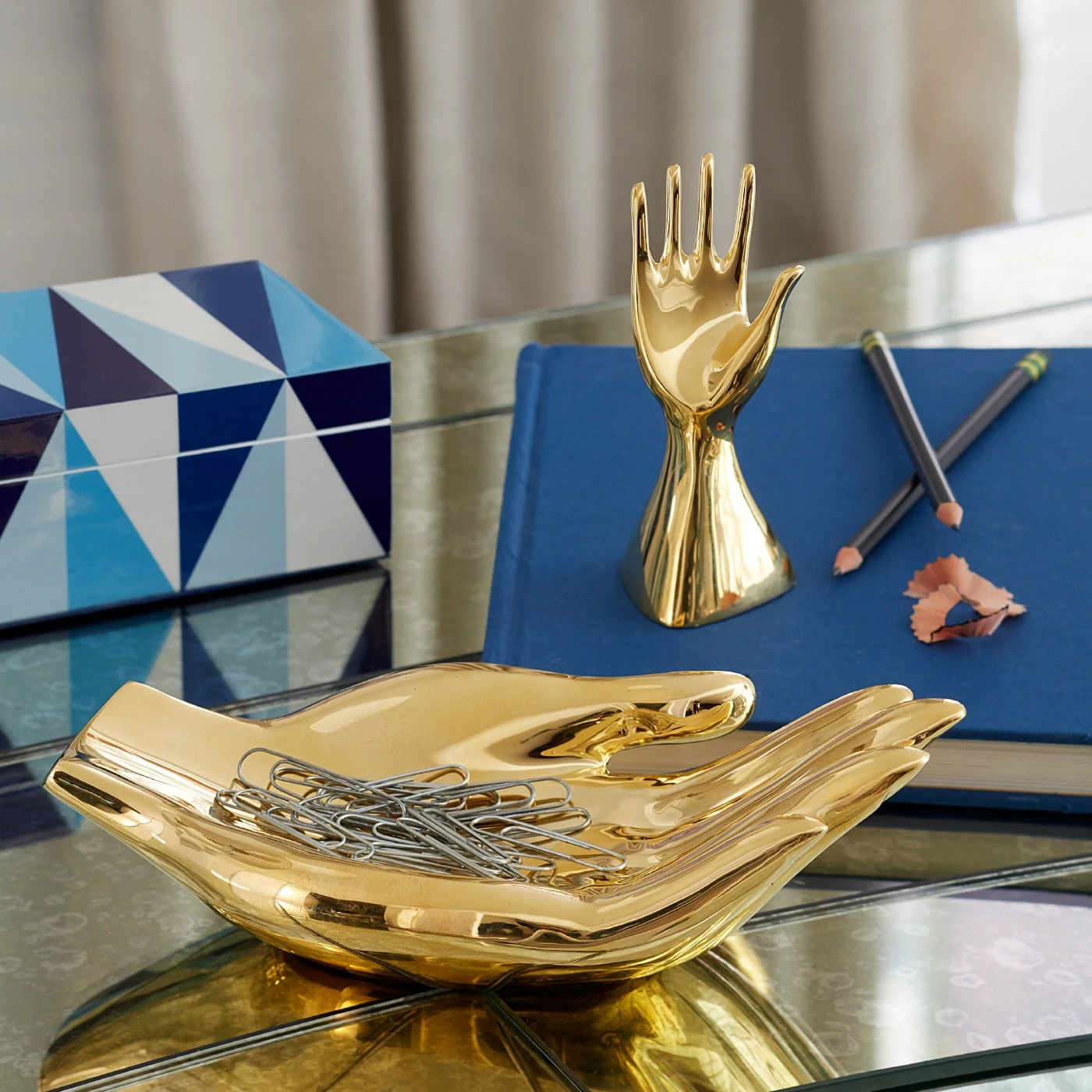 SP21_Brass_Hand_Bowl_Sharpener_02c9e7af-df5b-47af-9b5a-0bb57582f7bf.jpg Jonathan Adler Brass Hand Bowl All Décor