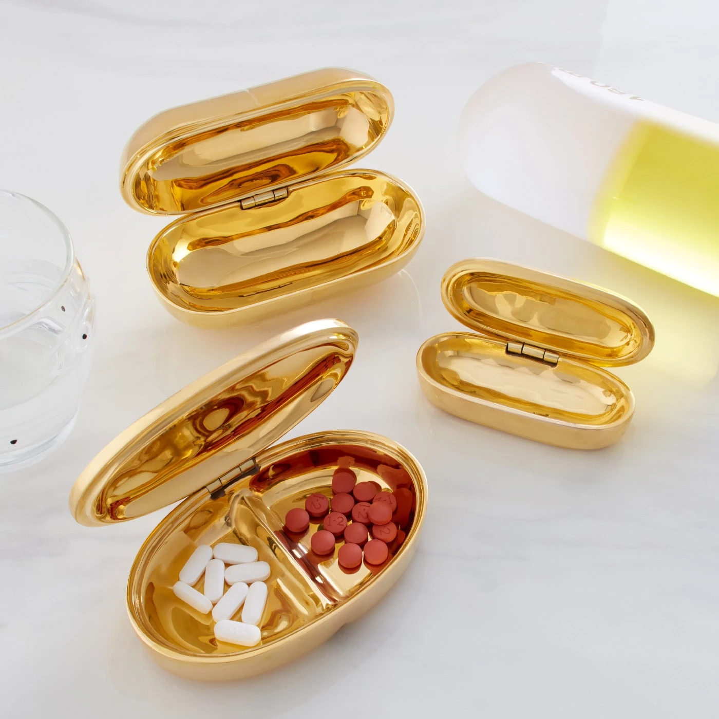 SP21_Brass_Pill_Boxes_b_e2207040-c6ee-46f2-a8b8-3ce7a151f972.jpg Jonathan Adler Xanax Pill Box