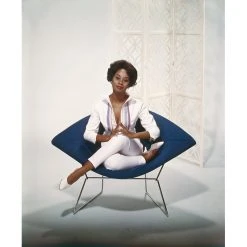 Jonathan Adler "Young Woman Sitting On Armchair" From Getty Images Photography